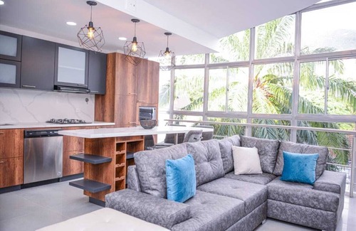 La Florida Apartment | 3 Bedroom Duplex PH Middle of Lleras Private Roof with Hot tub
