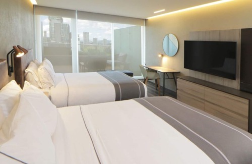 Providencia Hotel | 3 Boutique-Style Rooms in Trendy Providencia – Walk to Dining & Green Spaces