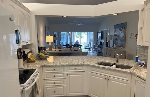 Pelican Bay Condo | 3 BR coach house at The Barrington Club in Pelican Bay. Private beach access.