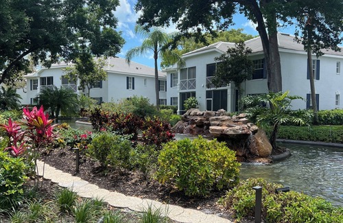 Pelican Bay Condo | 3 BR coach house at The Barrington Club in Pelican Bay. Private beach access.
