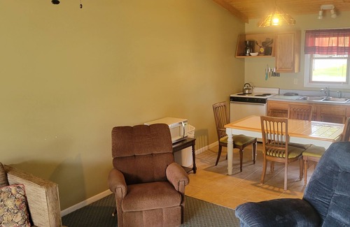 Oscoda Resort | #3 Thomas' Parkside Cottages, 2BR suite, private patio w/Lake Huron views.