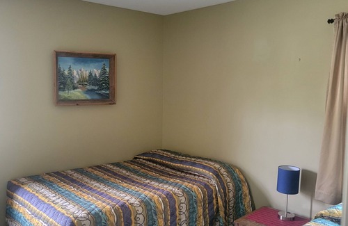 Oscoda Resort | #3 Thomas' Parkside Cottages, 2BR suite, private patio w/Lake Huron views.