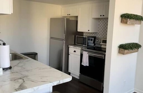Westown Apartment | 302/303- 2 condos joined for up to 12 people by Fiserv/3rd