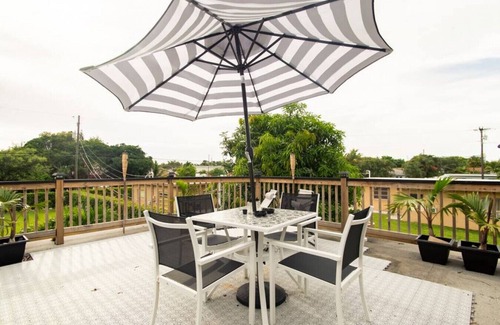 Delray Beach Apartment | 311 Upper · Upper Unit-NEW 2/1 Walk to EVERYTHING & Roof Deck!