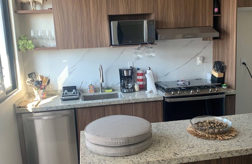 Puerto Vallarta Condo | 360 Rooftop Views, Charming, Modern, Quiet and steps to Shops and Entertainment!