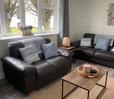 Scurlage House | 37 Gower holiday village Ty Seren Cosy 2 bedroom chalet with a seasonal indoor pool