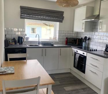 Scurlage House | 37 Gower holiday village Ty Seren Cosy 2 bedroom chalet with a seasonal indoor pool