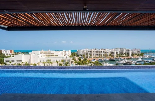 Playa Mujeres Apartment | 3BR Beachfront Luxury Condo w/Great Features