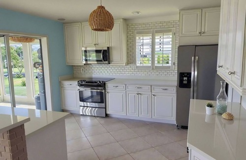 Alden Pines House | 3BR Coastal retreat in peaceful Bokeelia with pool, bikes, ping pong and fishing