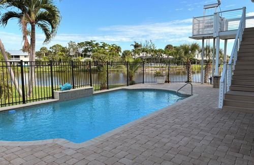 Alden Pines House | 3BR Coastal retreat in peaceful Bokeelia with pool, bikes, ping pong and fishing