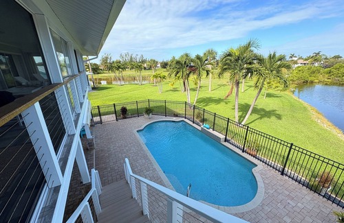 Alden Pines House | 3BR Coastal retreat in peaceful Bokeelia with pool, bikes, ping pong and fishing