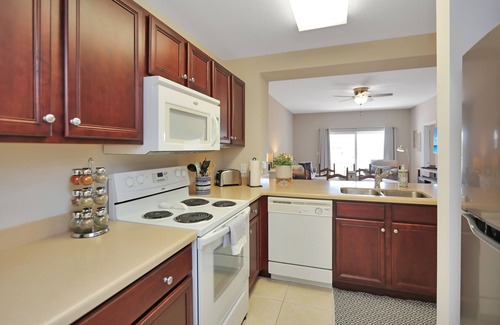 Waterside Village Condo | 3BR Condo on Canal, Walk from Beach with Community Pool ~ Waterside 203