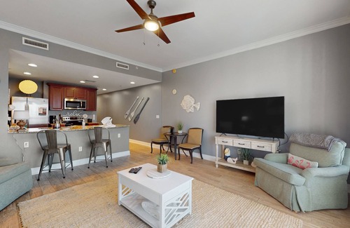 Upper Grand Lagoon Condo | 3rd-floor beach view condo with resort amenities, private balcony, W/D, & AC