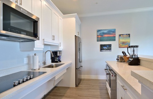Meadows Condo | 4-Bed, 3-Bath Waterfront Condo at Bayfront Suites & Marina