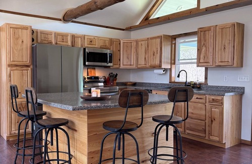 Crivitz Cabin | 4-bed Cabin- ATV/UTV trail access from the driveway with a bar/covered patio