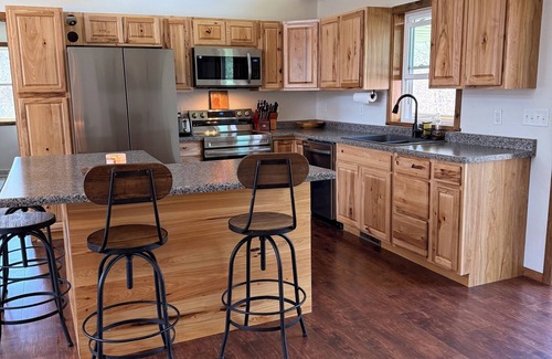 Crivitz Cabin | 4-bed Cabin- ATV/UTV trail access from the driveway with a bar/covered patio