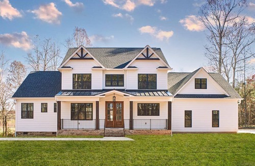 Pueblo House | 4-Bedroom /3-Bath Estate w Mountain Views, Covered Deck, Fitness Room, WiFi, AC