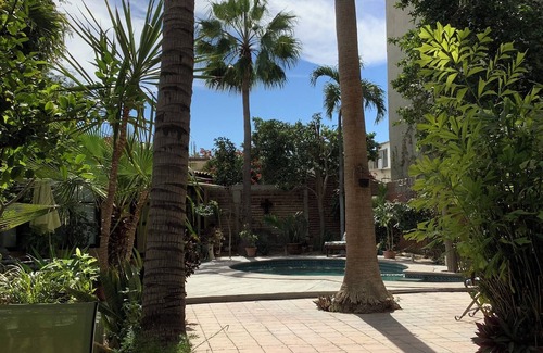 La Paz House | 4-bedroom house in La Paz WiFi, AC pool. Large garden yard. Your private resortn