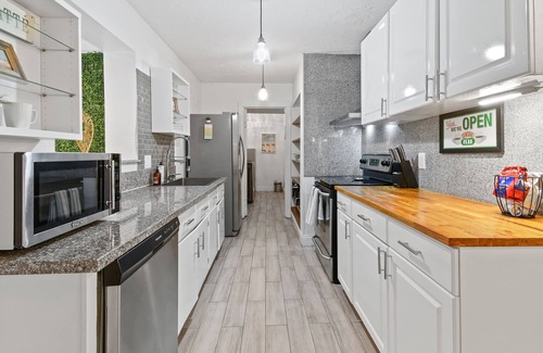 North Palm Beach House | 4 Bedroom Pool Oasis. Close to great Beaches & Baseball