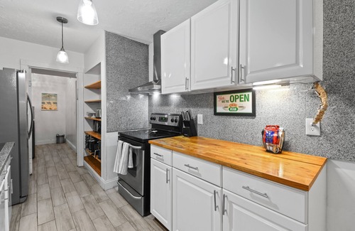 North Palm Beach House | 4 Bedroom Pool Oasis. Close to great Beaches & Baseball