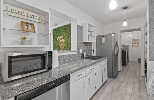 North Palm Beach House | 4 Bedroom Pool Oasis. Close to great Beaches & Baseball