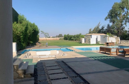 6th of October City Villa | 4-bedroom villa in 6th October with big garden & pool suitable for occassions
