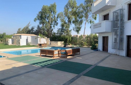 6th of October City Villa | 4-bedroom villa in 6th October with big garden & pool suitable for occassions