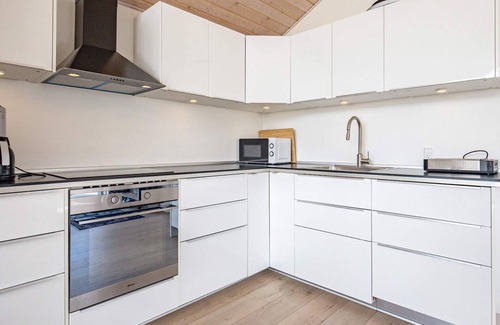 Hasmark Strand House | 4 person holiday home in Otterup