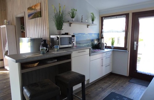Norderteil House | 4 person vacation home Windrose with canoe in Otterndorf