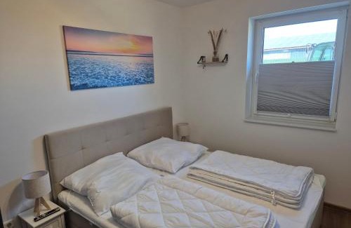 Dornum Apartment | 4 separate Ferienwohnungen in Traumlage mit Garten
