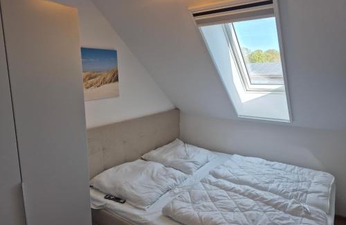 Dornum Apartment | 4 separate Ferienwohnungen in Traumlage mit Garten