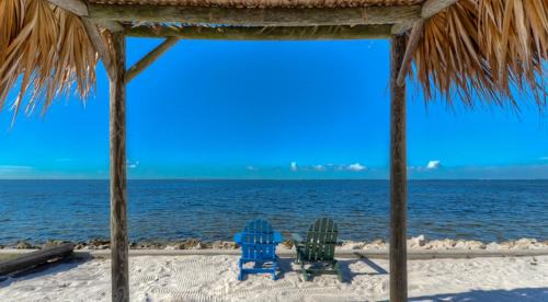 Rocky Point Apartment | 410-Gorgeous Views, Waterfront, WIFI, Pool and close to BUCS Stadium