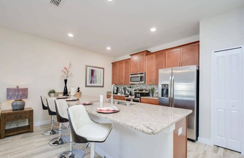 Kissimmee House | 4807- 4‑Bed Family Townhome + Private Pool at Storey Lake