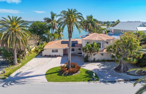 North Redington Beach House | 4bd 2ba Waterfront House with Pool, Hot Tub & Boat!