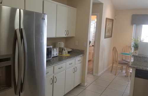 Indian Ridge House | 4br king master pool wifi minutes to disney, granite counters, tiled flooring