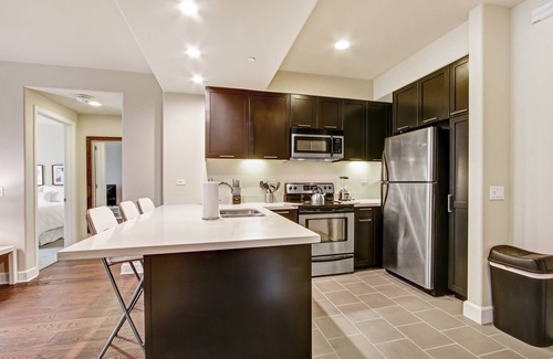 Downtown House | 4th floor 2B/2bath with private balcony overlooking the pool at the Americana!