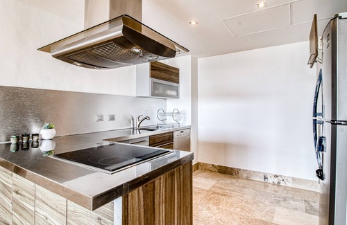 Playa Mujeres Apartment | 4th-floor resort apt with outdoor pools, pool spas, tennis, gym, & balcony