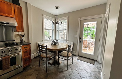 Melrose House | 5-bedroom house. Close to airport, bus & train. 10 min from Boston. Sleeps 10.