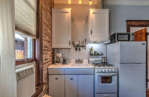 Midtown Apartment | #5 · Classic woodwork & details in 1912 Colonial!