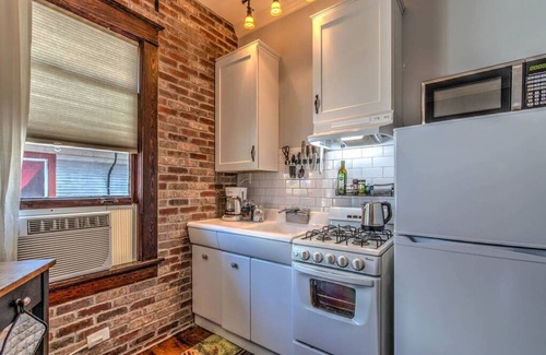 Midtown Apartment | #5 · Classic woodwork & details in 1912 Colonial!