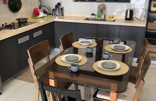 Central District Condo | 5 mins to CIQ and the city center, next to the beach and shopping center