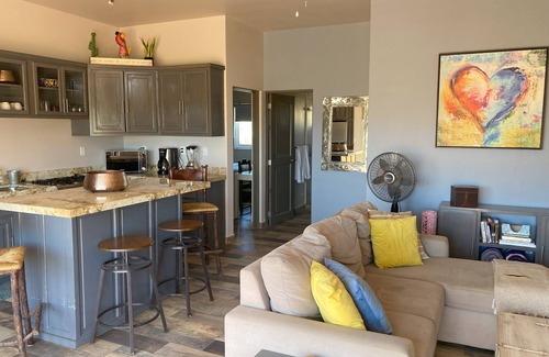 Cerritos Condo | 5 Star reviews! Penthouse! Steps from beach! Pool! Private! Hacienda vibes!