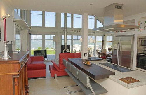 Olpenitz House | 5-star vacation home "Thor's Schleilounge" directly on the Schlei and Baltic Sea with a view of the water, to treat yourself to a well-deserved break from everyday life as a couple or with the family in the Baltic Sea resort of Olpenitz