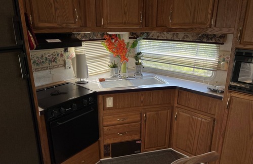 Forks House | 5th wheel on lot.