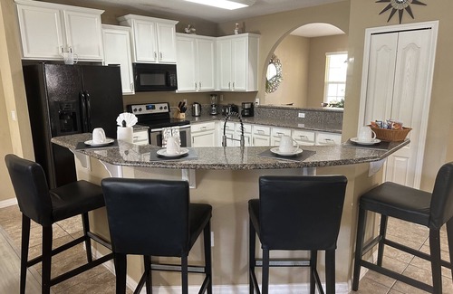 Calabria House | 6 bed 5.5 bath Home with Pool 14 MINUTES AWAY from Disney. We’re back on VRBO!