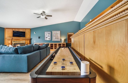 Prudenville House | 6BR Houghton Lake House w/Indoor Pool, Hot Tub, and Golf Simulator - Sleeps 24