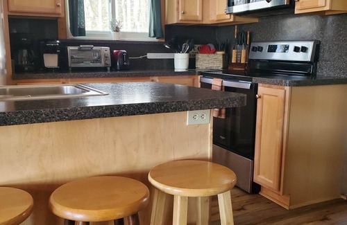 Intervale House | 7 Min to StoryLand,Great for families, PacMan Arcade game, Firepit, Dog friendly