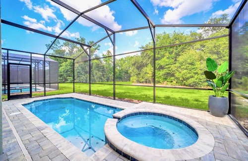 Four Corners House | 7BR Family Resort - Pool & Hot Tub - Near Disney