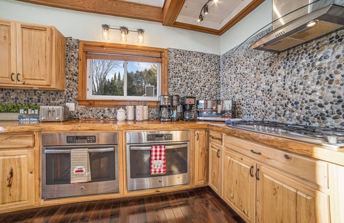 Gaylord Ski Chalet | 7K Sqft Lakefront Escape, Sandy Beach, Barrel Sauna, Game Room, Fire Pit