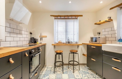 Milton-under-Wychwood Cottage | A charming and characterful Cotswold cottage in the heart of a quaint village.